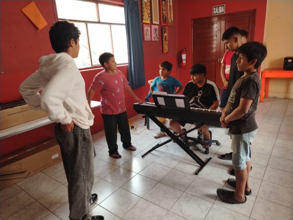 Students around the piano